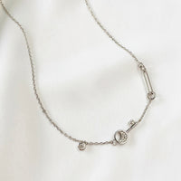 Crescent Key Silver Necklace | Wanderlust + Co
