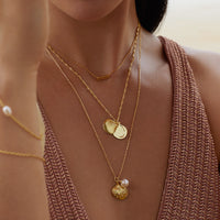 Seashell Gold Necklace | Wanderlust + Co 